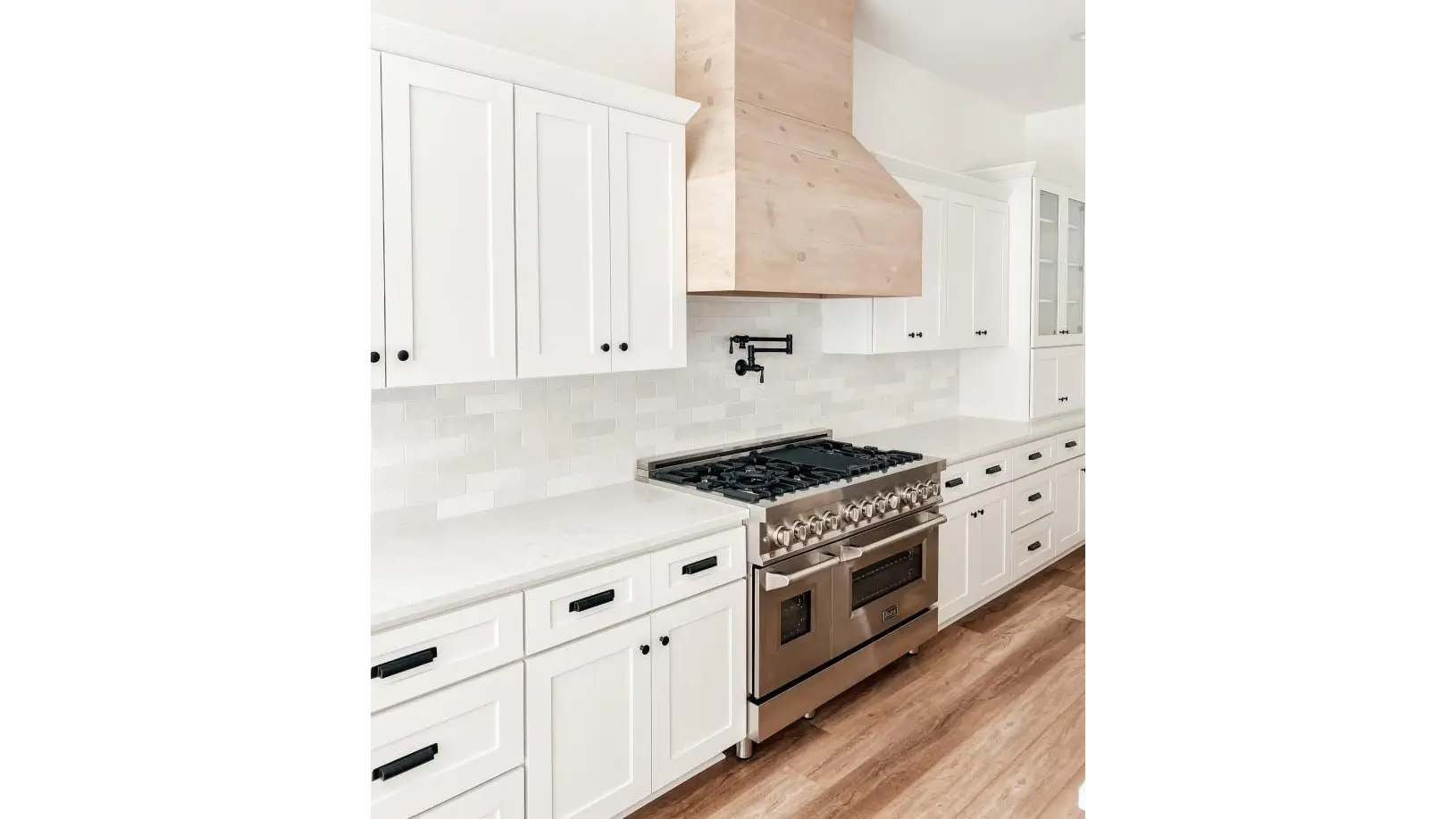 White Shaker kitchen with glass door wall cabinets - RTA Cabinets Canada