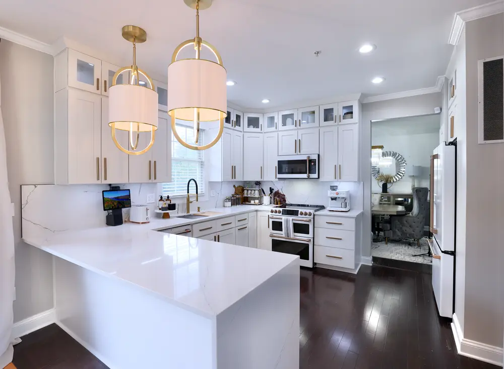 White Shaker wall and base cabinets with quartz counters - RTA Cabinets Canada